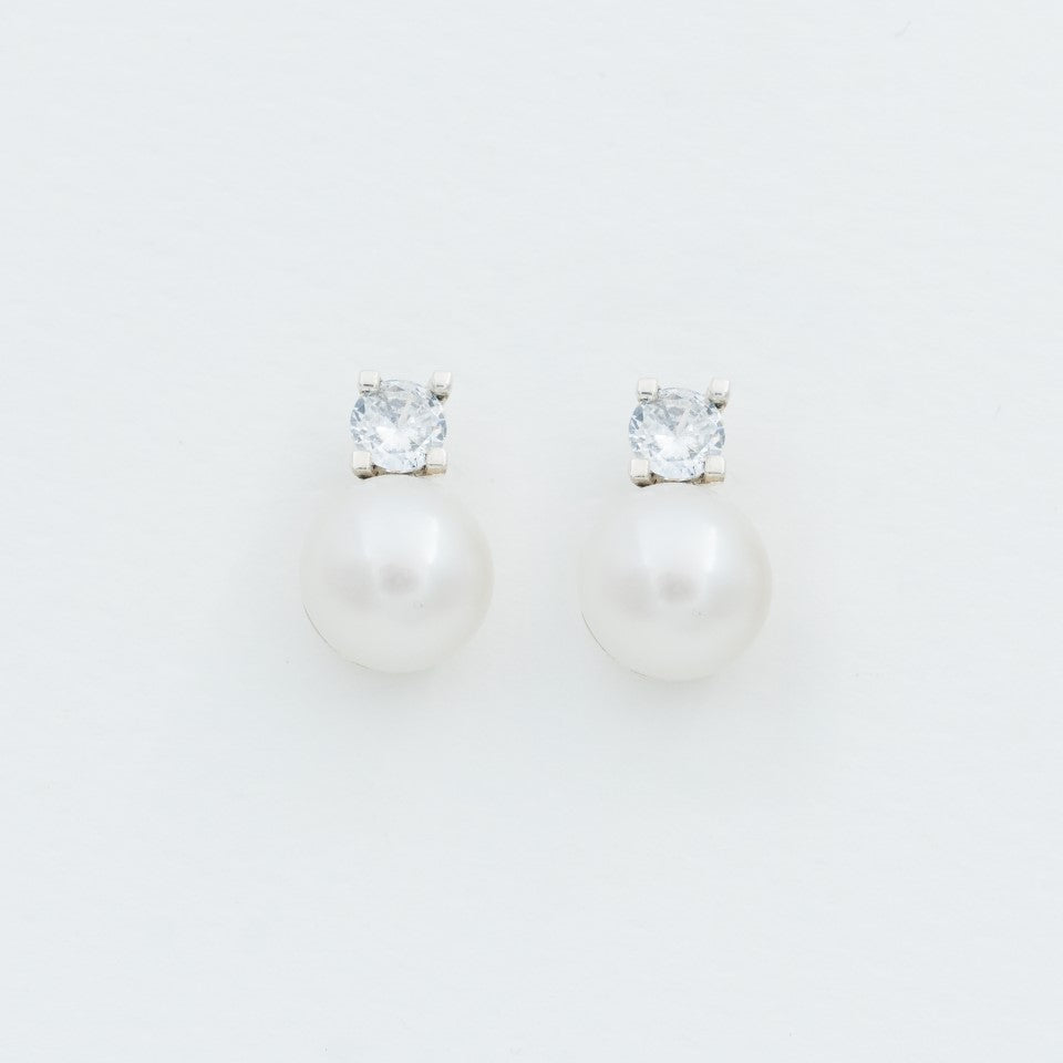 Arete plata 950 perla y circón. Joyería artesanal delicada brillante. Diseño sofisticado hecho a mano.
