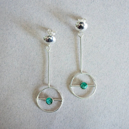 Silver 950 dangle earrings with a circular design and a Colombian emerald gemstone.