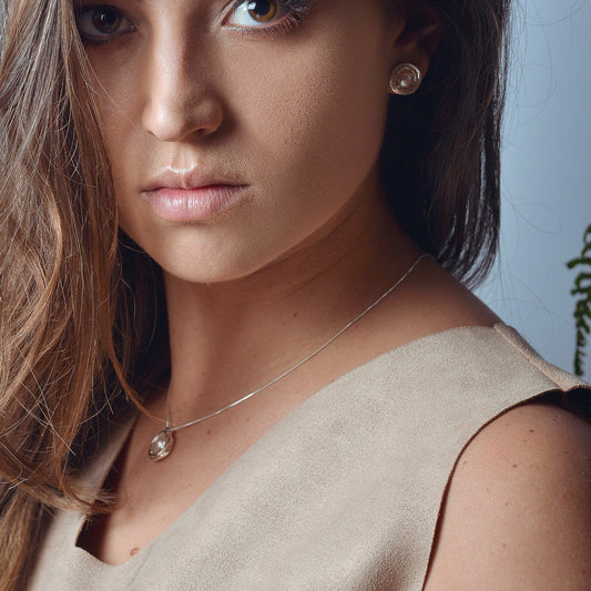 Topo nido plata y perla