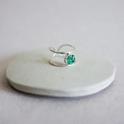 Silver 950 double band ring with a round, raw Colombian emerald gemstone.