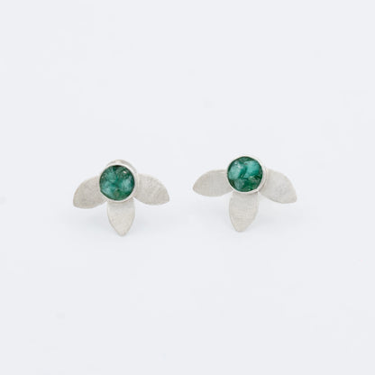 Handmade recycled silver 950 flower earrings with three petals and a vibrant Colombian emerald center.