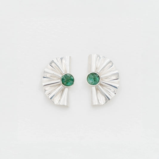 Pair of silver fan-shaped earrings with central round Colombian emeralds.