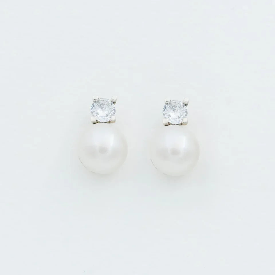 Arete plata 950 perla y circón. Joyería artesanal delicada brillante. Diseño sofisticado hecho a mano.