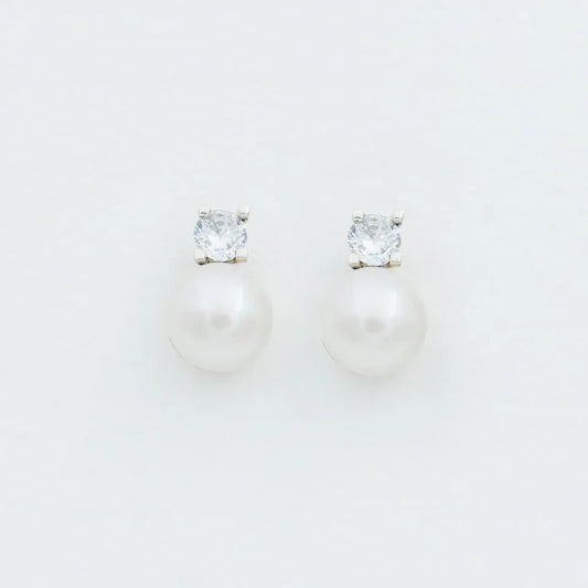 Arete plata 950 perla y circón. Joyería artesanal delicada brillante. Diseño sofisticado hecho a mano.