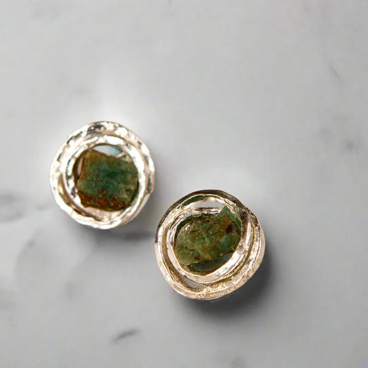 Handmade recycled silver earrings with raw Colombian emeralds, round and textured.