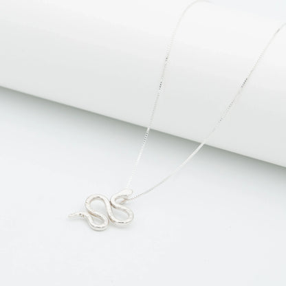 Silver 950 Mamba snake pendant necklace with a delicate chain on a white background.