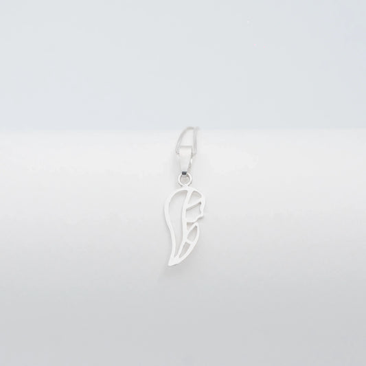 Silver 950 Virgin Mary silhouette pendant, handcrafted with a minimalist design.