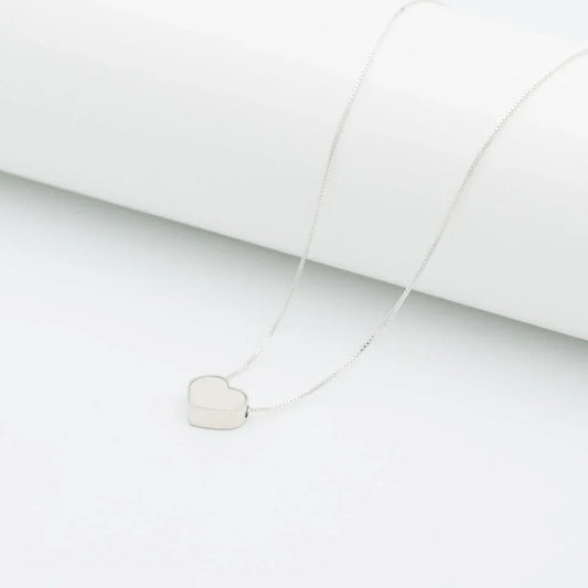 Dije corazón plata 950 romántico. Joyería artesanal sentimental clásica. Diseño amor hecho a mano.
